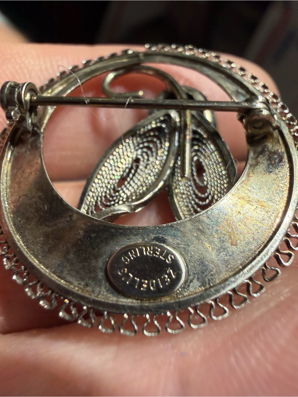 Zeidell’s Sterling Silver Hematite Filigree Circular Brooch